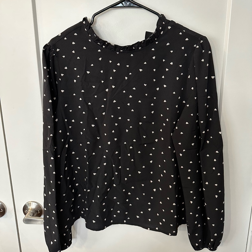 Black blouse with white hearts